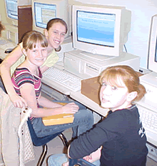 Lindey, Marlee, Miraanda working on documents